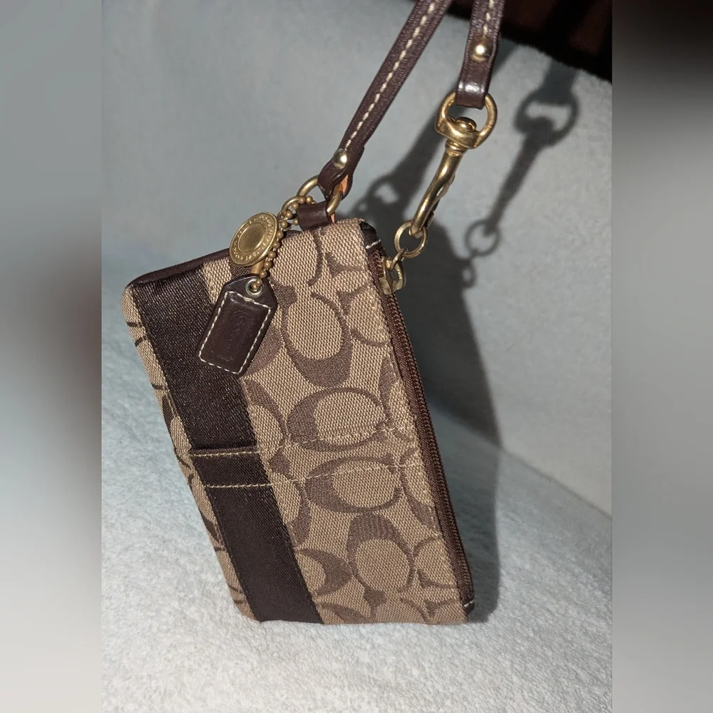 Coach Brown and Tan Signature Wristlet. 40028